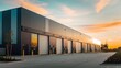 © Goashape-Studio - Modern Industrial Warehouse at Sunset: A sleek and contemporary industrial warehouse bathed in the warm glow of a setting sun, promising efficiency, innovation, and boundless potential.