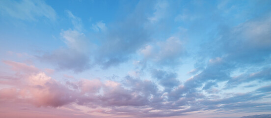 Wall Mural - beautiful tender sunrise sky with clouds. sky background.