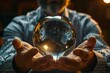 © Vera - business visionary using a crystal ball to predict the future.