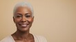 © GreenOptix - Attractive African American woman in her late fifties with short gray hair, smiling softly, soft colors, subtle makeup, natural beauty