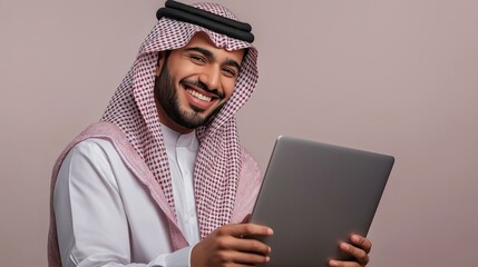 Saudi Arab Man working on laptop, isolated background 