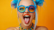© Willem505 - Rainbow Rebel Yell:  A close-up portrait of a young woman with bright blue hair, vibrant makeup, and funky rainbow sunglasses lets out an uninhibited yell against a vivid yellow background, embracing