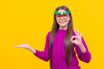 Wall Mural - happy new year. smiling child having fun. kid with party glasses.