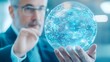 © Phichaphat - Businessman Holding Holographic Globe, Global Network Concept