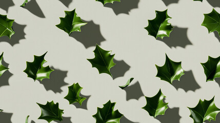 festive napkin rings shaped like holly leaves, each with a shadow, arranged on a light grey background, captured from above in minimalist style photography