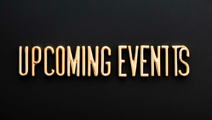 upcoming events word gold metallic shiny lettering on plain black background