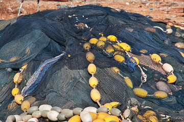 Wall Mural - Fishing net in the sea port of the small village not far Dakar, Senegal