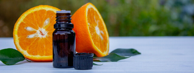 Wall Mural - orange essential oil. selective focus.