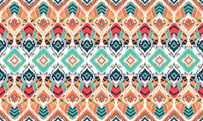 Wall Mural - Ikat seamless pattern,geometric design,motif ethnic handmade, Ikat ethnic tribal,boho colors seamless wallpaper. for background,fabric,wrapping,clothing,wallpaper,batik,carpet,embroidery style.