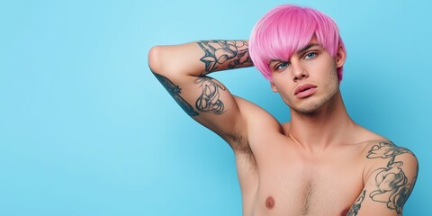 Wall Mural - A man with pink hair and tattoos on his arm and chest. He is posing for a picture