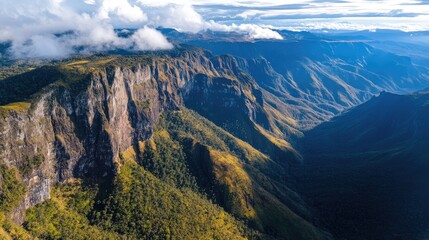 Aerial shot of the rugged mountains and deep valleys of the Horton Plains, with diverse flora and fauna