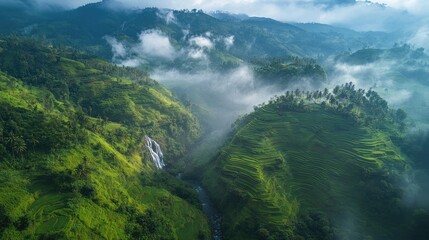 Bird's-eye view of the scenic landscapes and rice terraces around Ella, with waterfalls and misty hills