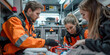© Nuth - Emergency medical team in orange uniforms working inside an ambulance, providing patient care.
