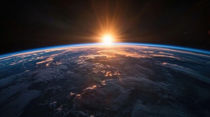 Poster - A beautiful image of Earth from space during sunrise, with a blue-toned light spreading over the horizon.