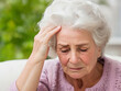 © Thanwa - Old woman has a headache, Old woman holding his head with headache