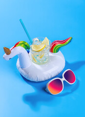 Poster - A vibrant summer vacation scene with floating flamingo and cocktail
