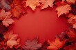 © MUdaylah - Autumn frame border of maple leaves on red background. Happy Thanksgiving Day, Halloween, Harvest concept with generative ai
