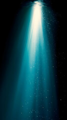 Poster - Underwater light beams through the dark blue water with shimmering particles.