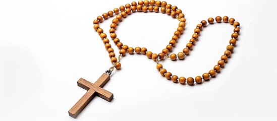 Rosary Catholic cross isolated on a white background Copyspace