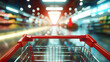 © John - Empty red shopping cart with supermarket grocery store interior aisle abstract blurred background