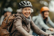 © Kseniya - Active senior people are riding bicycles outdoors by a road in nature. Middle age woman is riding a bike in a forest, happy and smiling, active live concept
