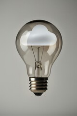 Wall Mural - Cloud Computing Concept Illuminated Light Bulb with a White Cloud Inside on a Gray Background