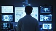 © Media Srock - Silhouette of a Person Examining Digital Displays and Screens