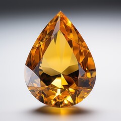 Wall Mural - A stunning orange citrine gemstone featuring a brilliant teardrop cut on a white background