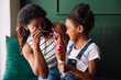 © (JLco) Julia Amaral - Happy family moment with ice cream indoors