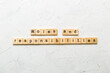 © sosiukin - roles and responsibilities word written on wood block. roles and responsibilities text on table, concept