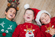 © ADDICTIVE STOCK - Children in festive attire celebrating Christmas joyfully
