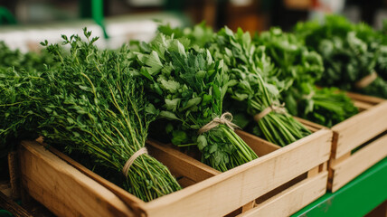 Wall Mural - Freshly cut herbs tied in small bundles laid on a wooden crate farm market stall background 