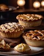© Julija - Freshly baked pastries and pies are arranged attractively on a table in a warm bakery. Their golden brown crusts feature beautifully crafted designs topped with a dusting of sugar. Generative AI