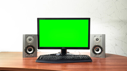 Computer green screen monitor is standing on a desk in an office timelapse hyperlapse.