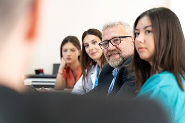 Wall Mural - Group of Medical Team and Business People Meeting in Hospital and Office Conference Room