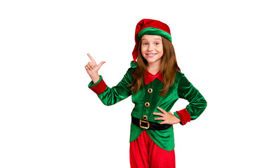 Sticker - Portrait of lovely child elf in hat showing her finger point at ads recommend party wearing green elf costume hat cap isolated over red background