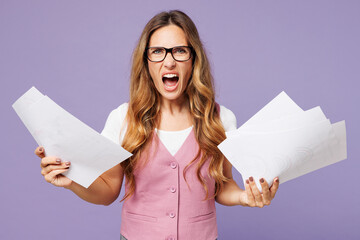 Wall Mural - Young sad angry stressed employee business woman corporate lawyer in classic suit vest white t-shirt glasses work in office hold paper account documents cry isolated on plain pastel purple background.