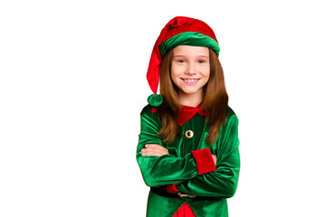 Sticker - Portrait of cheerful elf girl in hat with her hands crossed smiling ready to help in christmas night wearing cap costume isolated over red background