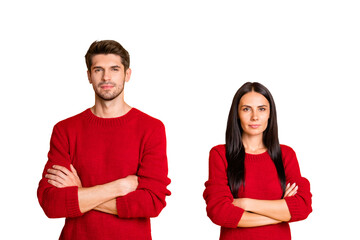 Canvas Print - Portrait of concentrated couple with crossed hands wear red jumper isolated over yellow background