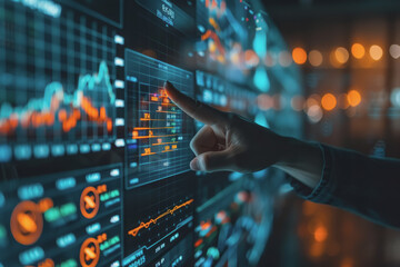 Wall Mural - Hand pointing at financial chart displayed on digital screen showing stock market analysis.