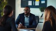 © fotofabrika - Business meeting with a diverse team discussing strategies in a modern office setting during the afternoon