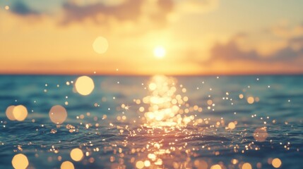 Wall Mural - as the sun sets over the ocean, sparkling light dances on the water's surface, creating a serene twi