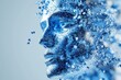 © Leo - Theory of mind Cognitive development Abstract digital face composed of blue particles disintegrating into the air symbolizing the fragility of identity in the digital age