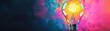 © Chanoknan - Creative light bulb with colorful neon trails represents innovation and bright ideas against a dark background Concept of energy and imagination