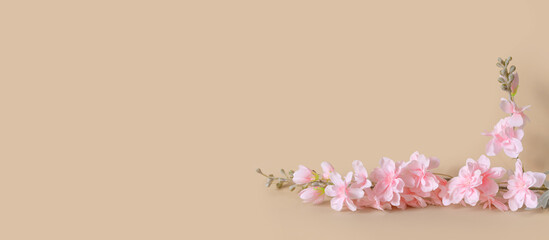 Sticker - Bouquet of delicate artificial flowers on pink background.