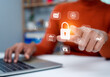 © Thawatchai Images - Business Woman showing key and network security represents protection against cyber attacks and online hacking, Protection against external hacks, Cybersecurity and privacy concepts to protect data.