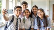 © N7 - Indian Teenagers Taking Selfies in School