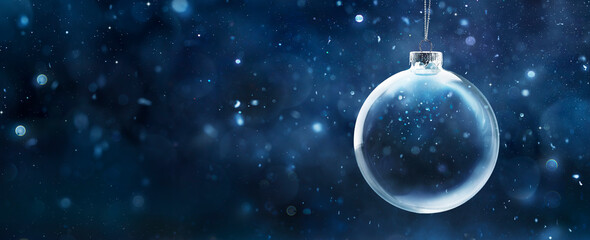 Wall Mural - Christmas Snow Globe In Eve Night - Wish Concept With Blue Abstract Defocused Background