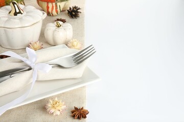 Wall Mural - Beautiful table setting with autumnal decor on white background