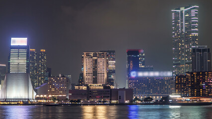 Hong Kong Cultural Centre with colorful light projection on its wall timelapse hyperlapse.